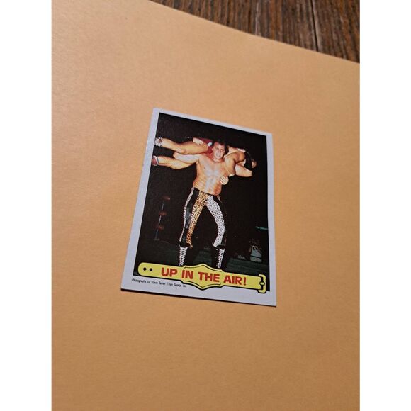 Vintage 1985 WWF Ringside Action Trading Card #26 Brutus Beefcake Body Slam - Picture 1 of 3